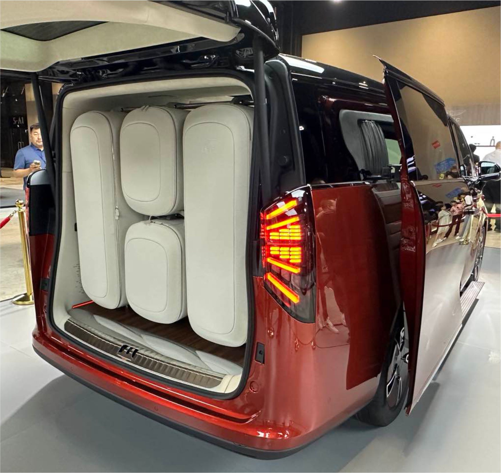 LEVC L380 — red variant rear access with luggage storage