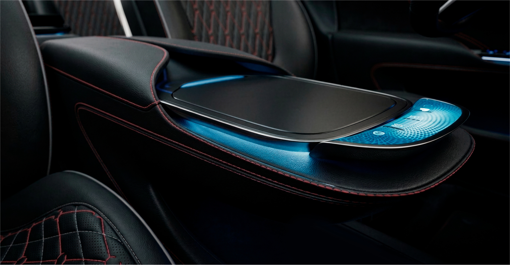 Center console — close-up, charging surface with crystal detail and ambient lighting