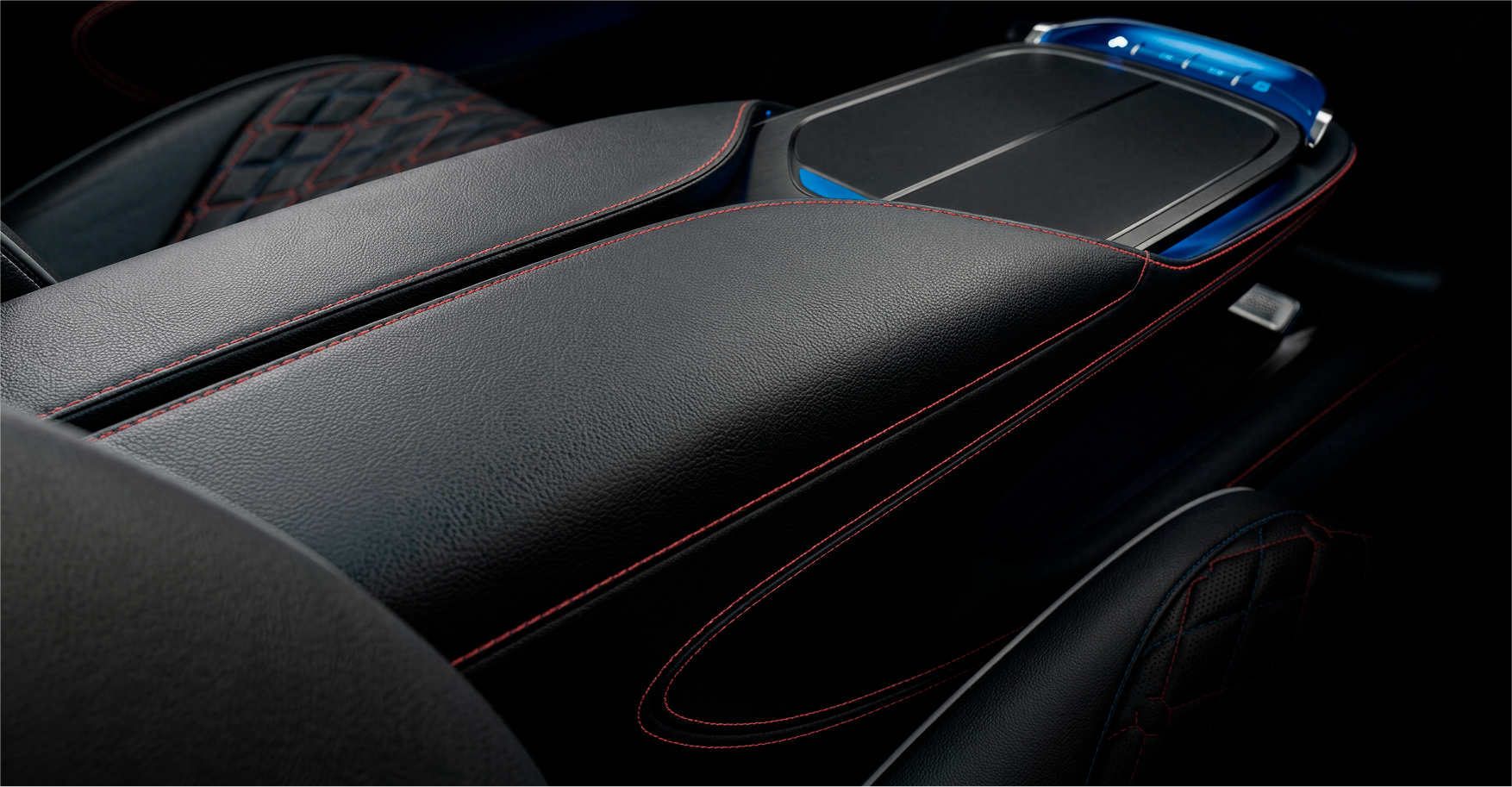Center console — side view, leather and stitching detail